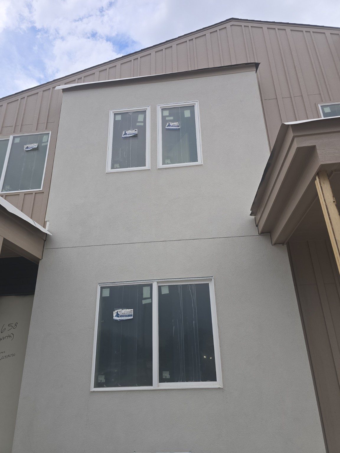 Abricos Glass residential window installation on stucco exterior in Thornton
